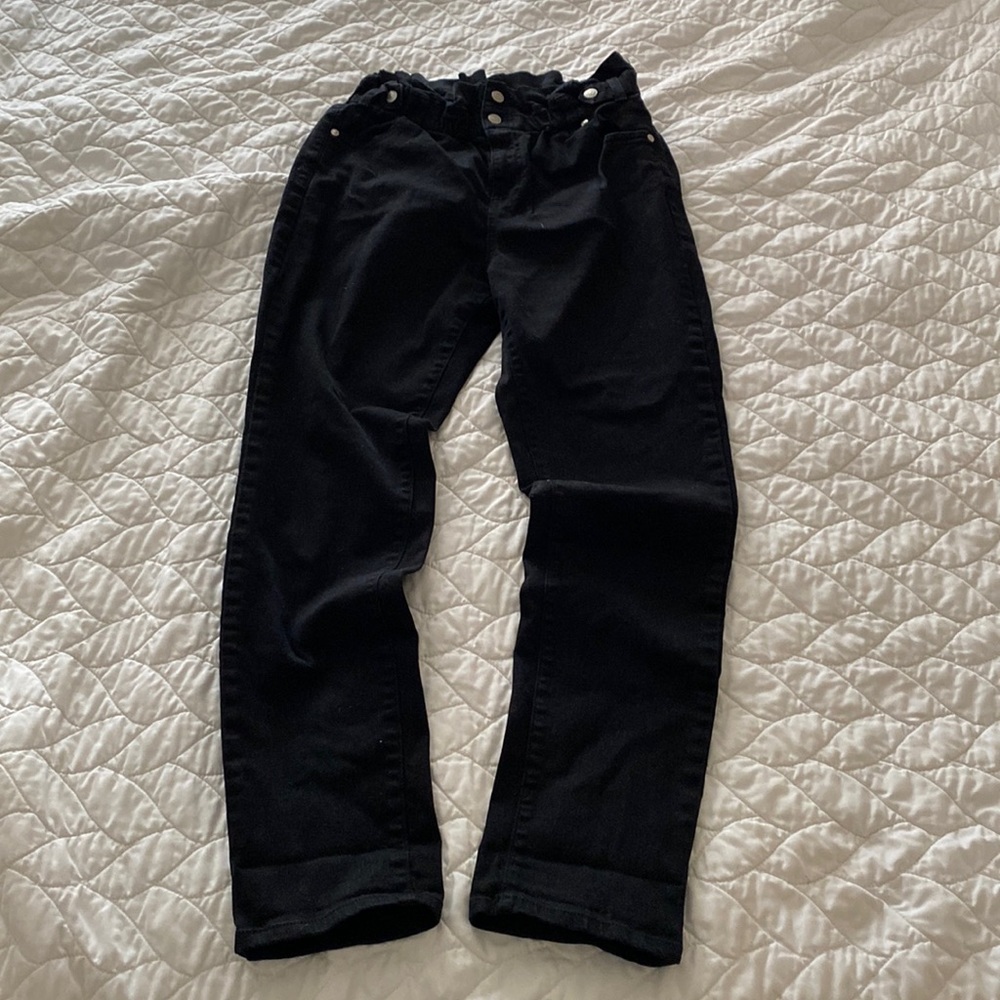 Medium black paperbag jeans.